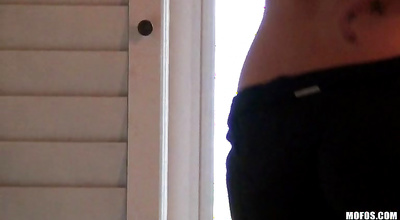 Lewd barely legal Britney Beth has her big tits revealed before teasing a cock